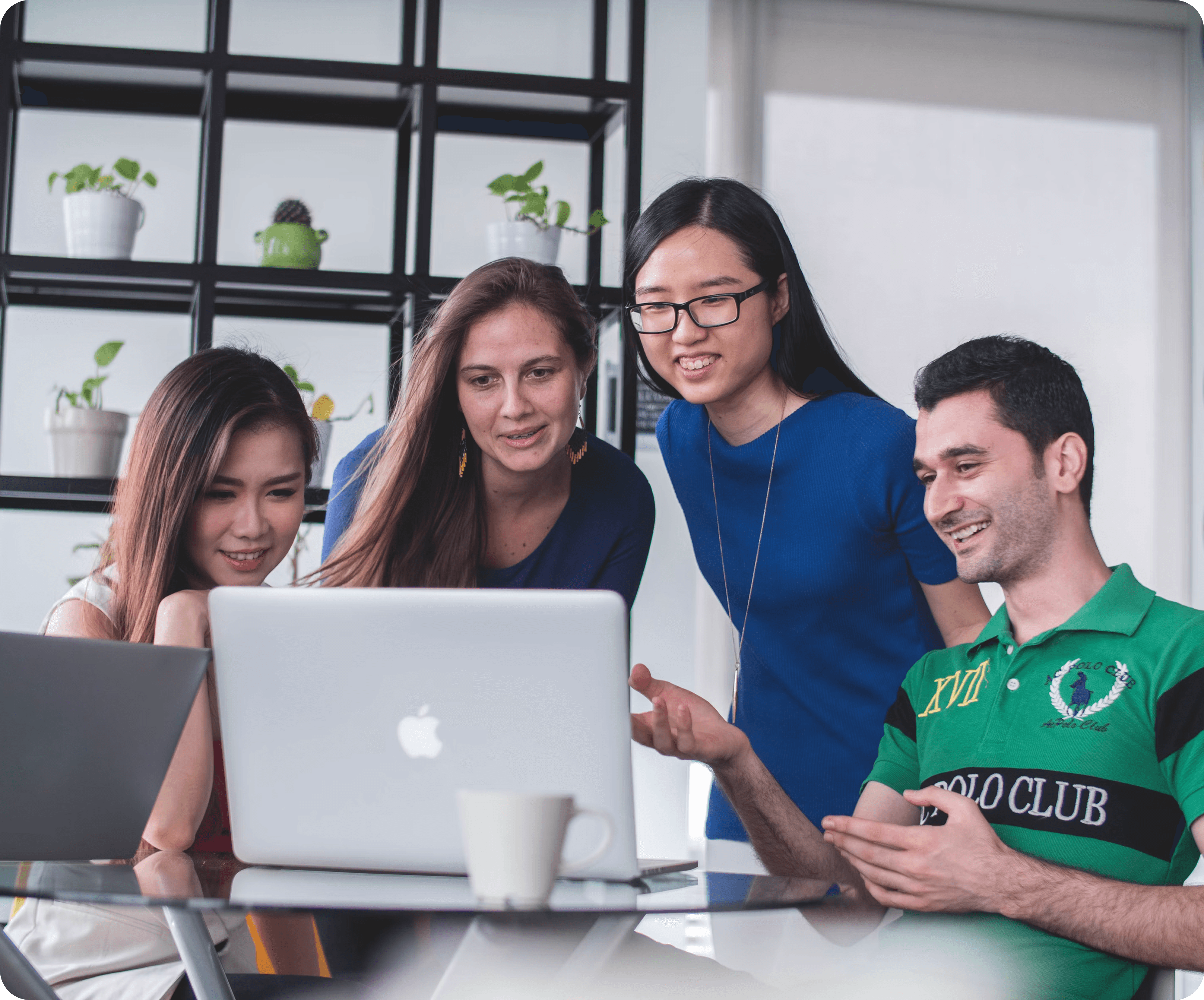 Designers discussing a new design on a laptop